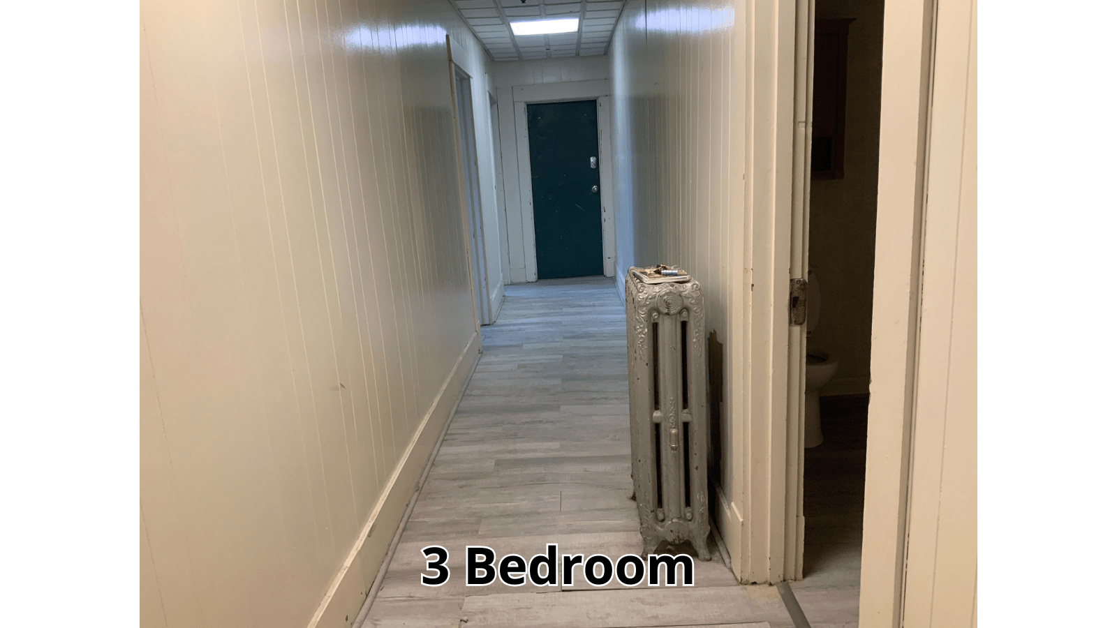 3 Bedroom hallway with radiator