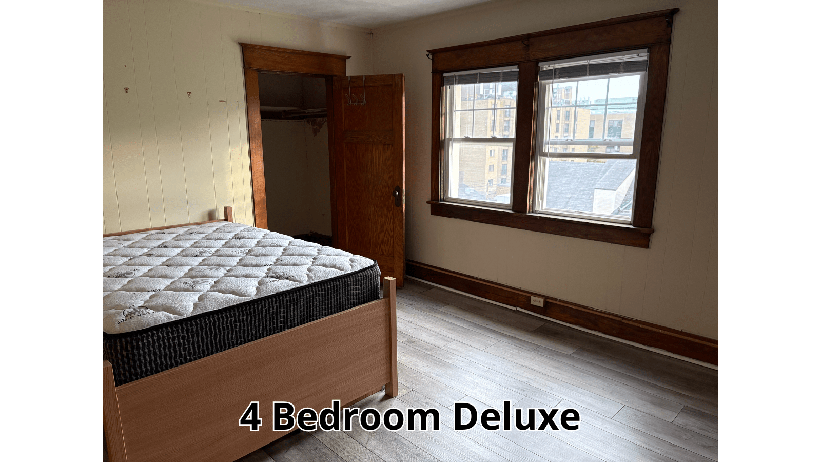 Bedroom with bed and windows