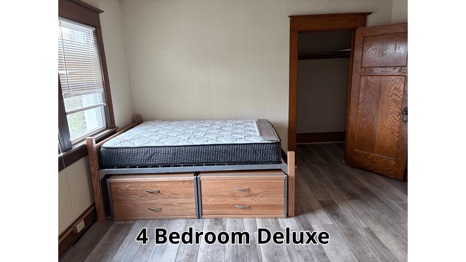 Bedroom with bed and storage drawers