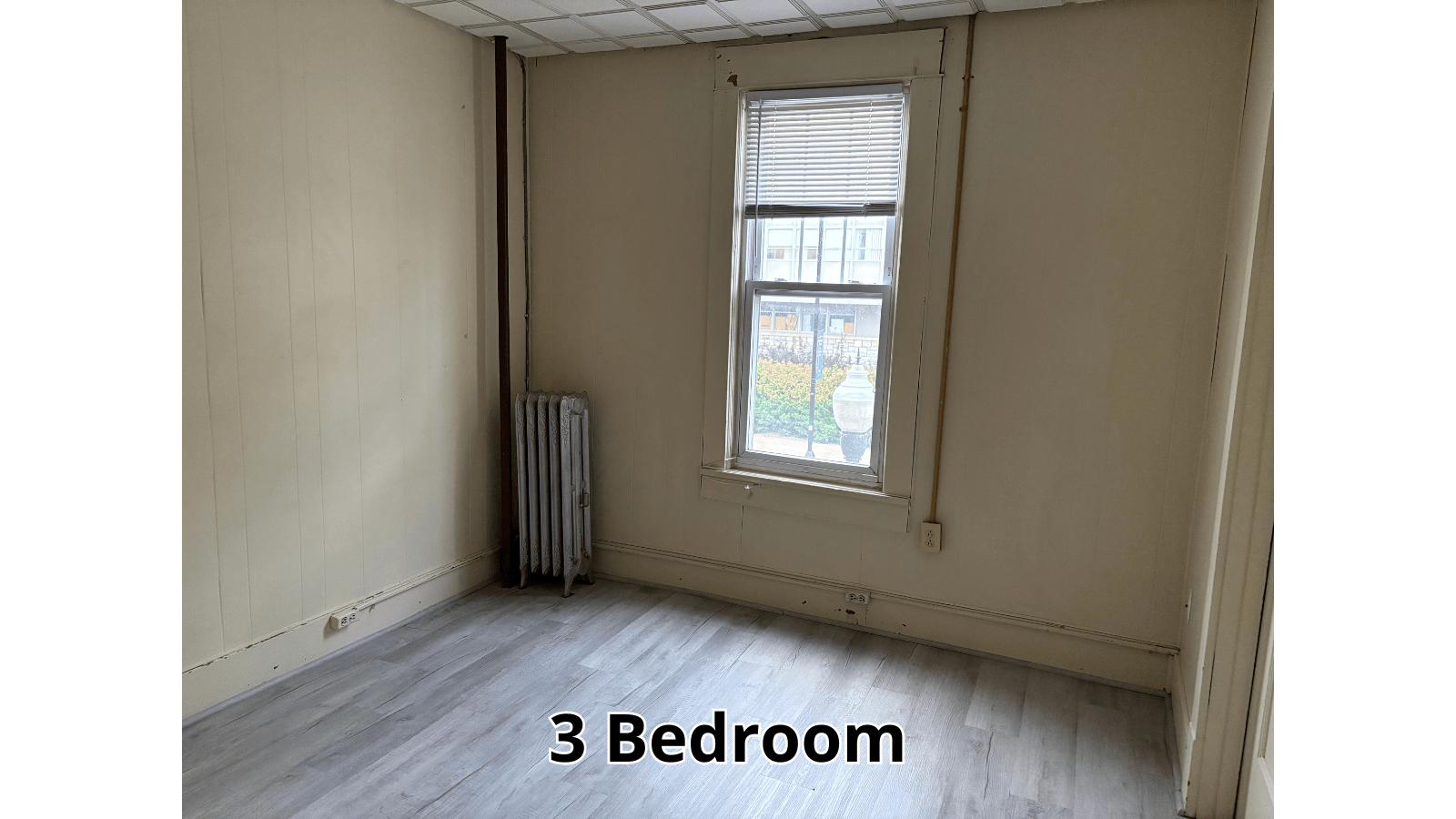 Empty 3 bedroom apartment with radiator