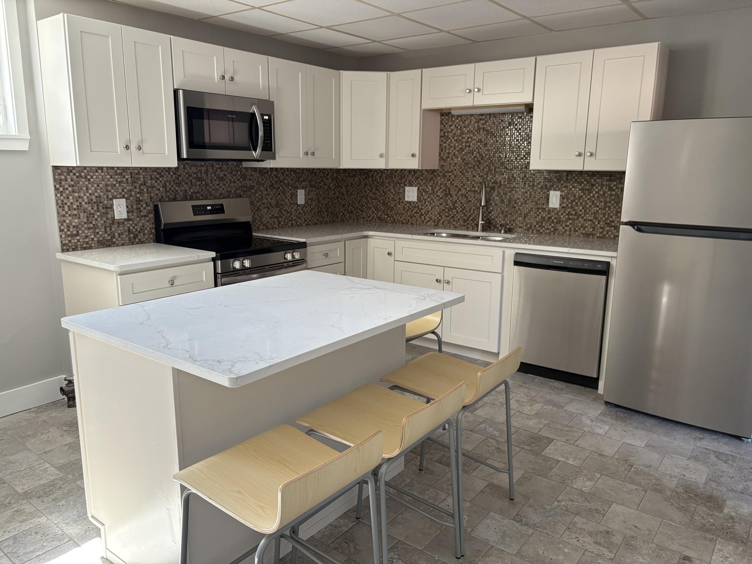 Modern white kitchen with island