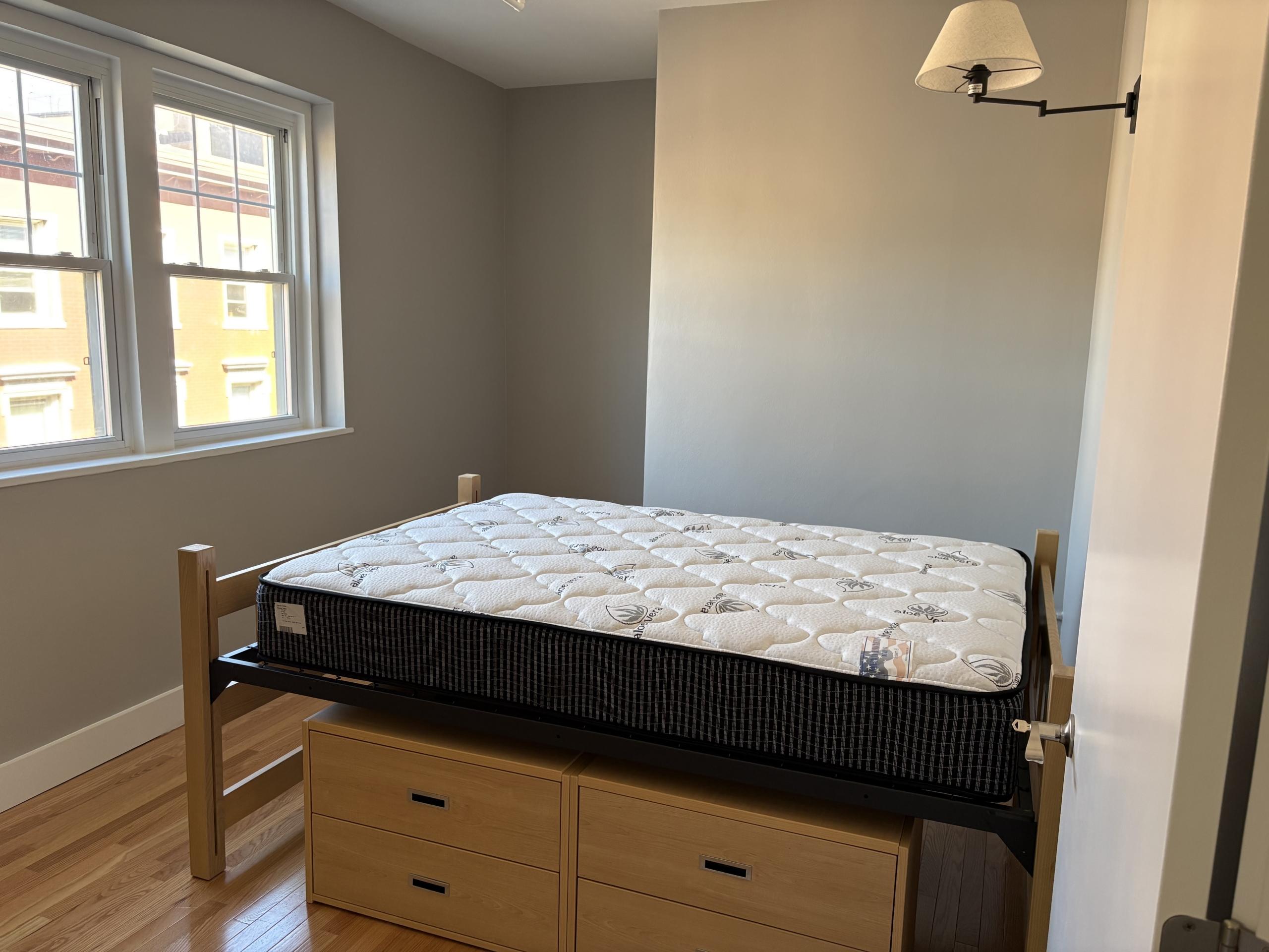 Mattress on a raised bed frame