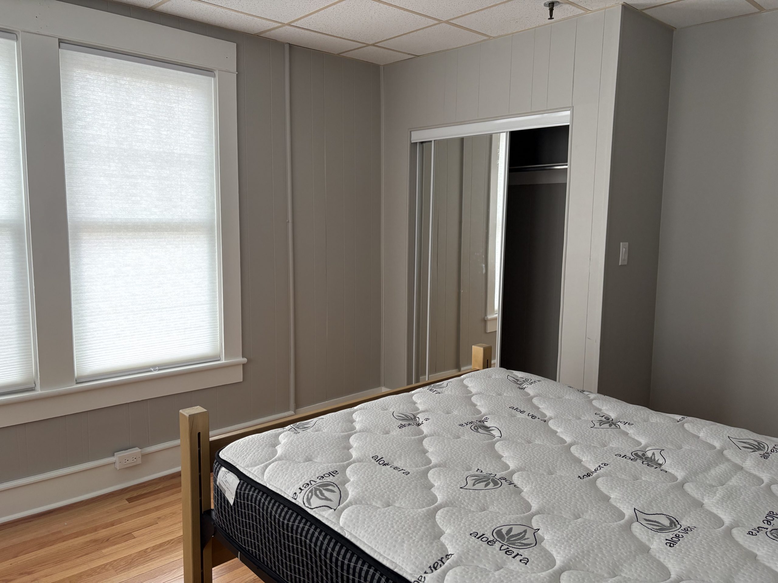 Bedroom with mattress and closet