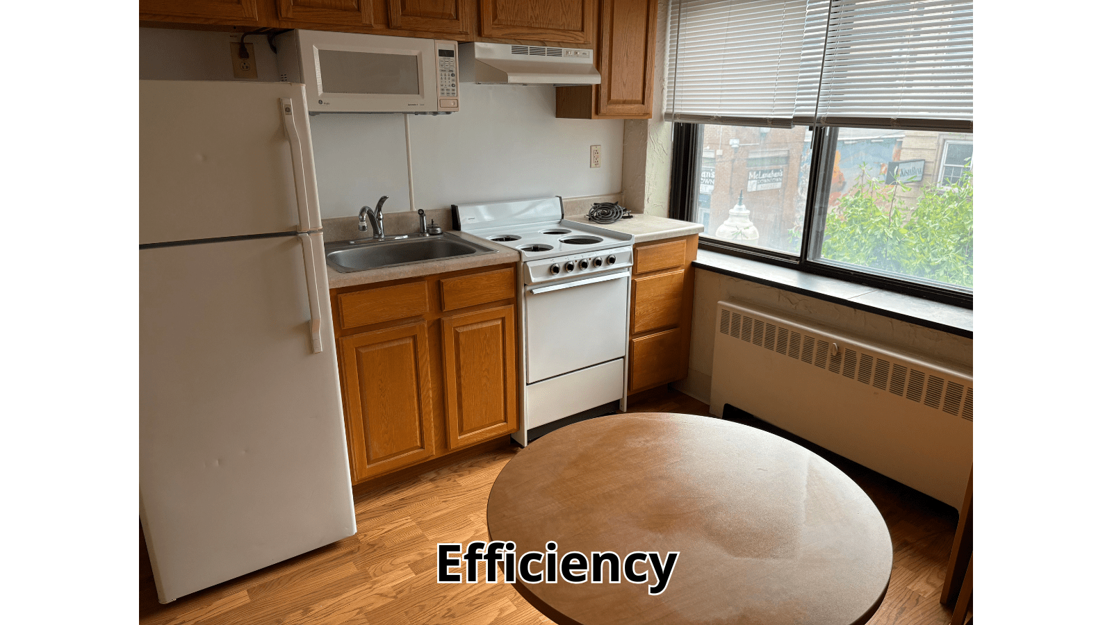 Efficiency apartment kitchen with dining table