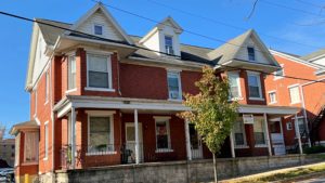 Exterior of a brick, two-story duplex house