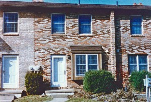 Exterior of a townhome with multi-colored bricks