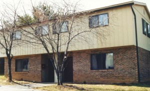 Exterior of one of the duplexes at 931-953 W Aaron Drive