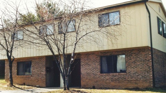 Exterior of one of the duplexes at 931-953 W Aaron Drive