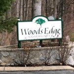 Woods Edge Townhomes sign
