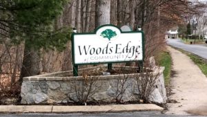 Woods Edge Townhomes sign