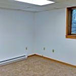 Unfurnished, carpeted bedroom