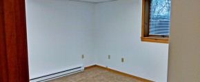 Unfurnished, carpeted bedroom