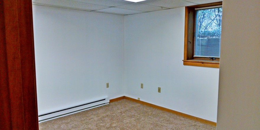 Unfurnished, carpeted bedroom