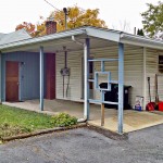 Carport with blue and white siding