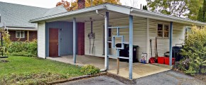 Carport with blue and white siding