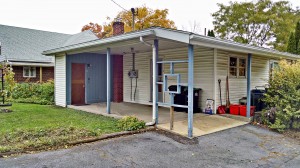 Carport with blue and white siding