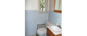 Bathroom with vanity, toilet, and medicine cabinet