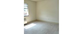 Unfurnished carpeted bedroom