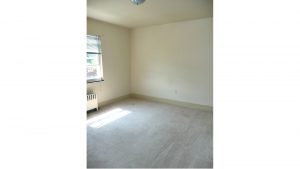 Unfurnished carpeted bedroom