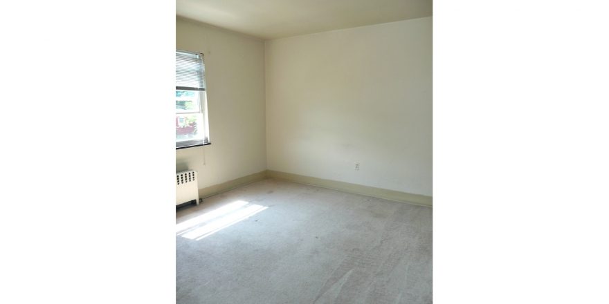 Unfurnished carpeted bedroom