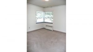 Unfurnished carpeted living room