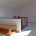Multi-purpose attic office space. Stairs coming up in to the middle of the room.
