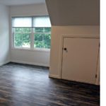Unfurnished bedroom with wood-style flooring