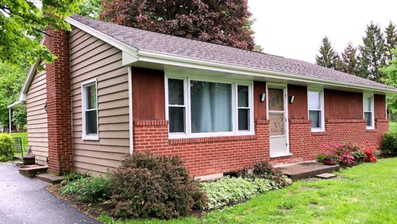 Exterior of ranch house with brick and siding