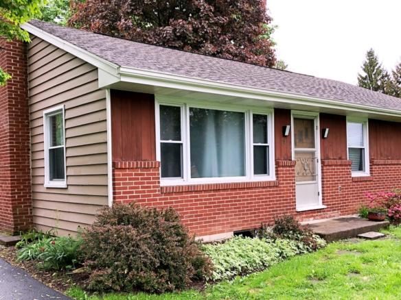 Exterior of ranch house with brick and siding