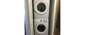 Laundry closet with stackable washer and dryer