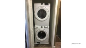 Laundry closet with stackable washer and dryer
