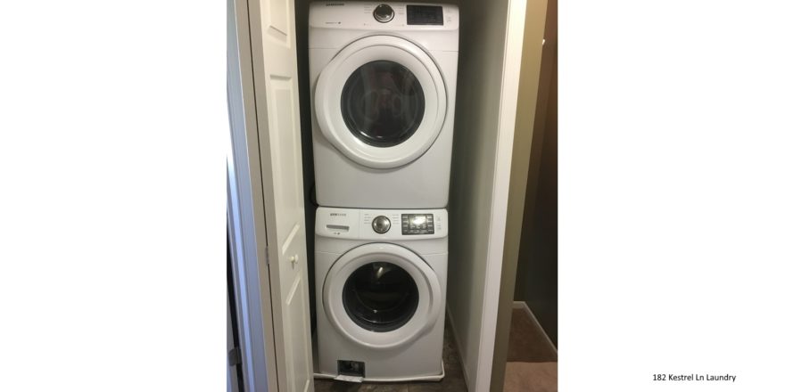 Laundry closet with stackable washer and dryer