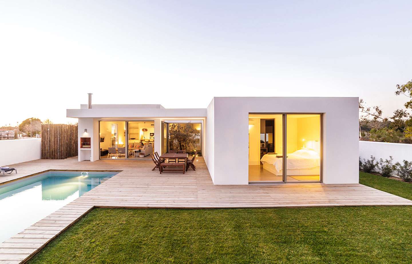 a house with a pool in the backyard
