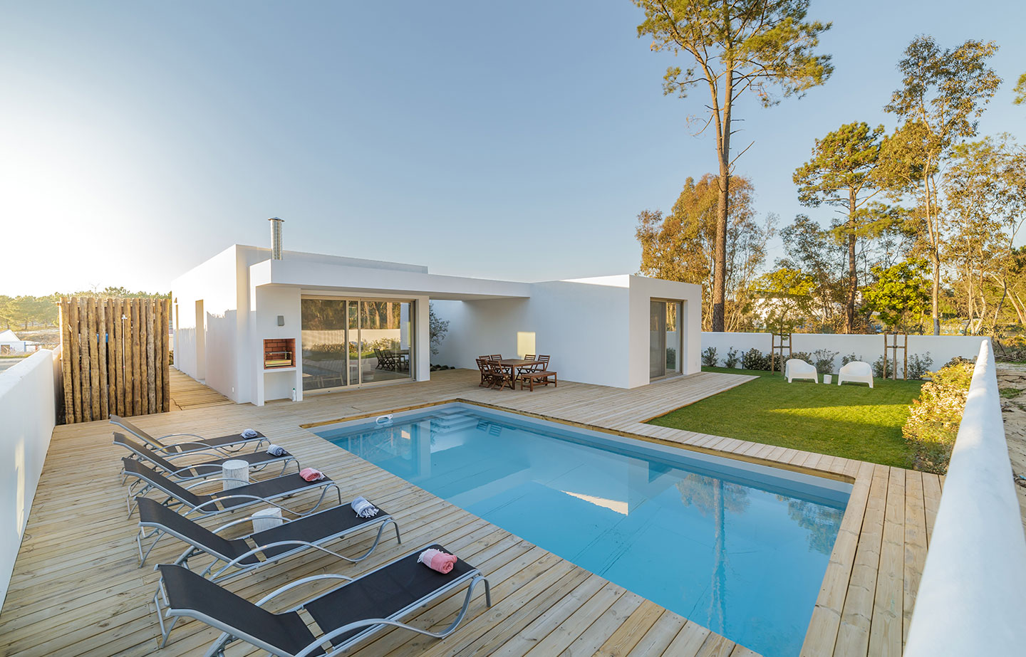 a house with a pool in the backyard