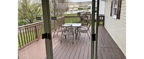 Wooden deck with table and chairs