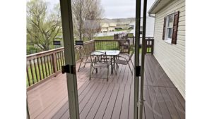 Wooden deck with table and chairs