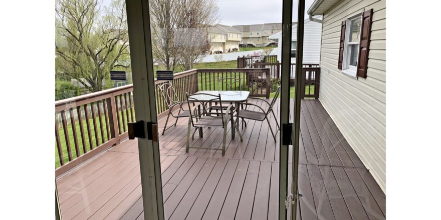 Wooden deck with table and chairs