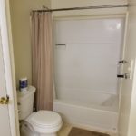 Bathroom with toilet and tub/shower combo