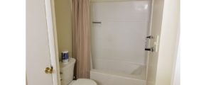 Bathroom with toilet and tub/shower combo