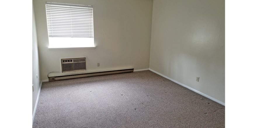 Unfurnished carpeted bedroom