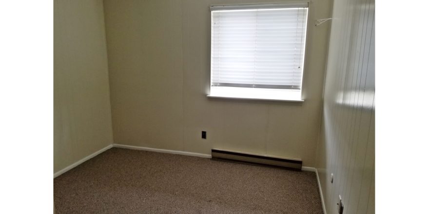 Unfurnished carpeted bedroom