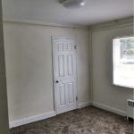Unfurnished carpeted bedroom