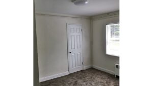 Unfurnished carpeted bedroom