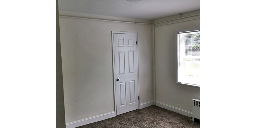 Unfurnished carpeted bedroom