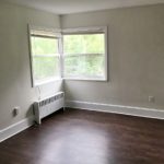 Unfurnished living room with wood-style flooring