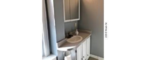Bathroom with vanity and medicine cabinet with mirror