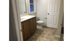 Bathroom with vanity and toilet