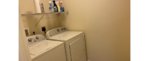 a washer and dryer in a small room