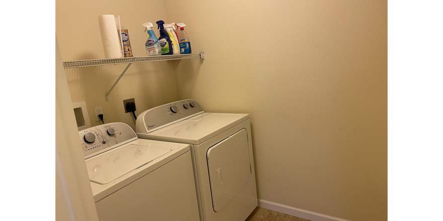 a washer and dryer in a small room