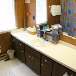 Bathroom with toilet and large vanity